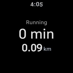 WalkiNova always-on view while running: 0 min and 0.09 km in dim grey